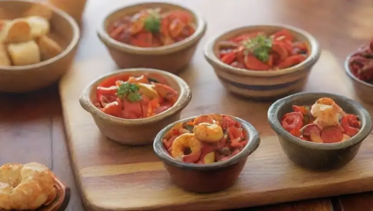 Una celebración vibrante de la gastronomía española con tapas, colores y culturas