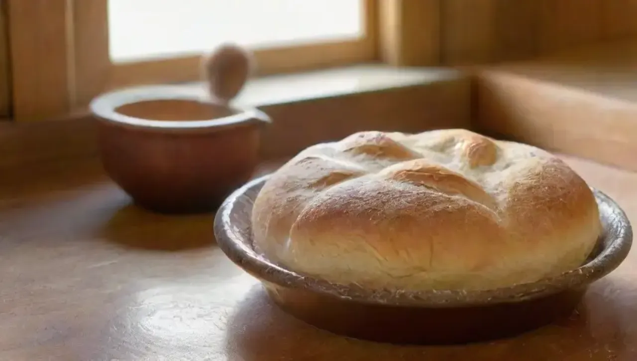 La elaboración del pan se vive en cada detalle, desde la masa dorada hasta el aroma cálido que llena la cocina