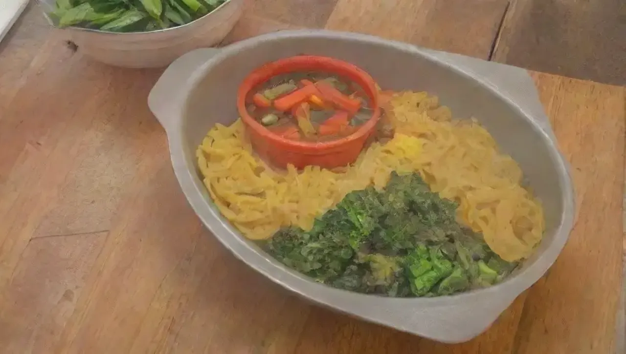 Una acogedora escena familiar de cocina con sopa humeante, verduras frescas y risas compartidas