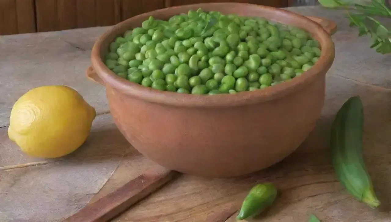 Guiso de guisantes frescos en una cocina rústica, con ingredientes y aromas que invitan a disfrutar